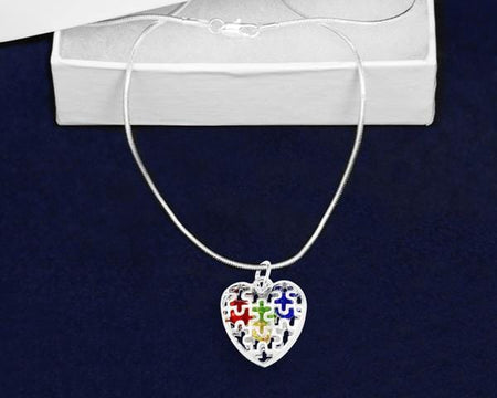 Autism Puzzle Piece Caged Heart Necklace